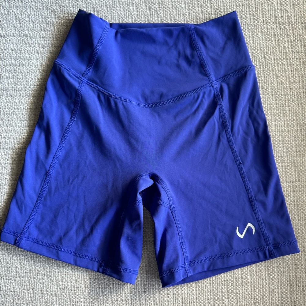TLF Shorts Size small. Indigo color, performance material.